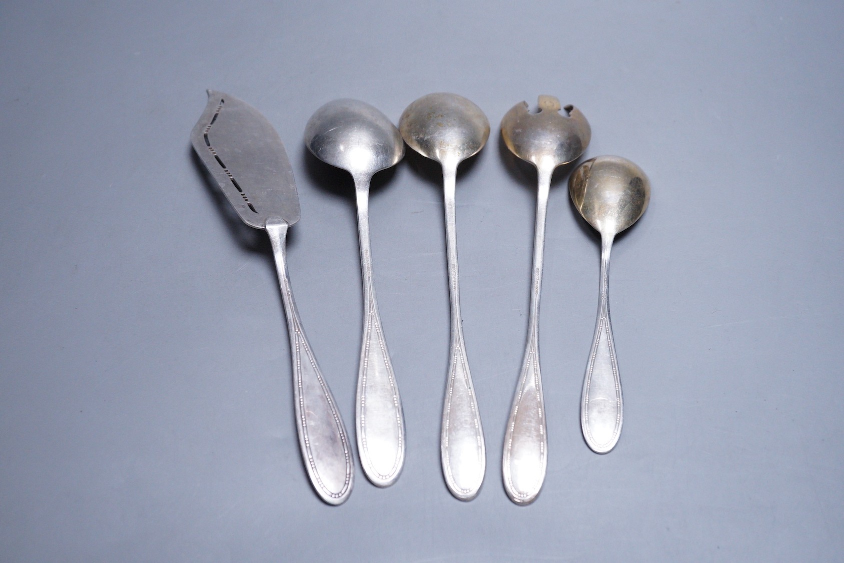 Five items of German 800 standard flatware including a pair of salad serves and a fish slice